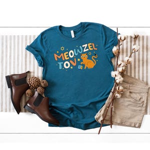 Meowzel Tov T-Shirt, Dreidel Menorah Cat Shirt, Jewish Cat Owner Gift, Chanukah Gift Shirt, Funny Hanukkah Shirt, Jewish Cat Hanukkah Shirt