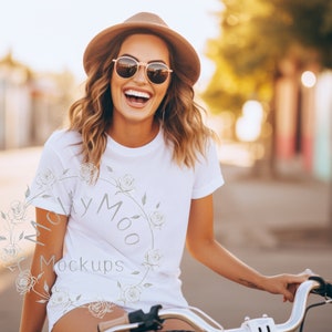 Women on Bicycle White T-Shirt Mock-up, Black Bella Canvas 3001 Mock-up, White Basic T-shirt Mockup, Women&#39;s Outdoor Street T-Shirt Mock-up.