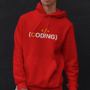 May include: Red hooded sweatshirt with a white graphic that says "{</>CODING}" in a yellow and white font.