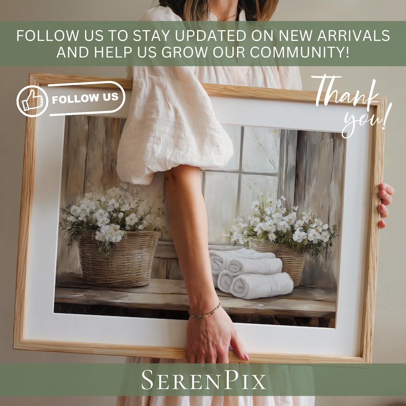 May include: A framed print featuring a serene interior scene with white flowers in wicker baskets, rolled white towels, and a window. The print is held by a person. Text on the frame says "FOLLOW US" and "Thank you!" and "SERENPIX".