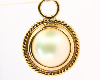 Colgante vintage de oro macizo de 9 quilates con halo de perlas y forma circular. Regalo ideal.