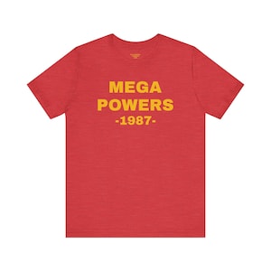 May include: Red t-shirt with a yellow graphic that says "MEGA POWERS -1987-"
