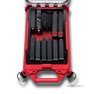 May include: A red, rectangular case with a clear lid, holding multiple black magazines. The case has a handle and two metal loops. The text "* INSERT ONLY *" is at the bottom.