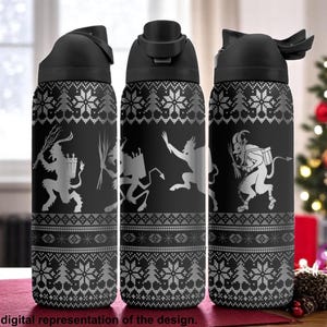 May include: Black water bottles with a festive design. The bottles feature a repeating pattern of snowflakes and fir trees, with illustrations of Krampus figures. The bottles have black lids and are displayed on a red surface.