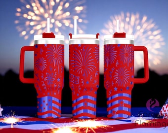 May include: Three red insulated tumblers with handles, decorated with blue fireworks and star patterns. Each tumbler has a white lid, a red handle, and a white straw. The tumblers are on a red, white, and blue surface with fireworks in the background.