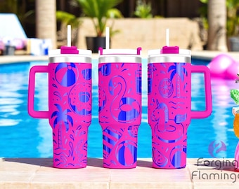 May include: Three pink insulated tumblers with handles, white lids, and straws. Each tumbler features a blue pattern of beach-themed icons, including flamingos, palm trees, and beach balls. The tumblers are set against a pool background.