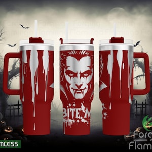 May include: Red and silver insulated tumbler with a handle, featuring a vampire design and the text "BITE ME". The tumbler has a white straw and a red lid. The design includes white drips.
