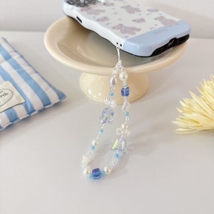 Precioso dije azul con cuentas para teléfono en 3 diseños: llavero, dije para bolso, dije para cámara, correa para la muñeca, dije Y2K, pulsera para teléfono y correa para bolso.