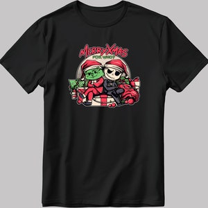 以下が含まれることがあります： クリスマスをテーマにしたグラフィックがプリントされた黒いTシャツ。映画「ナイトメア・ビフォア・クリスマス」のグリンチとジャック・スケリントンが描かれている。キャラクターの上に「メリークリスマス フォー フー？」というテキストが書かれている。