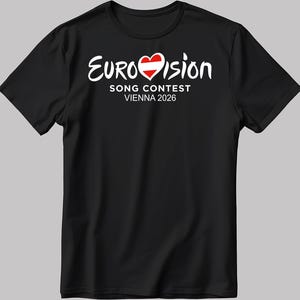 May include: Black t-shirt with the Eurovision Song Contest logo, incorporating a heart in the Austrian flag colours. The text "SONG CONTEST VIENNA 2026" is printed below the logo in white.