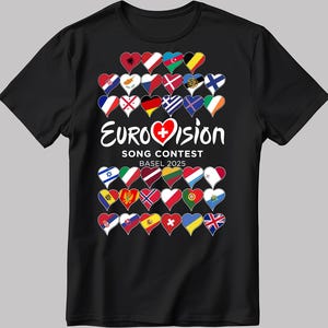 Könnte beinhalten: Schwarzes T-Shirt mit einer weißen Grafik von Herzen mit Flaggen, die verschiedene Länder repräsentieren. Der Text "Eurovision Song Contest Basel 2025" ist unter den Herzen gedruckt.