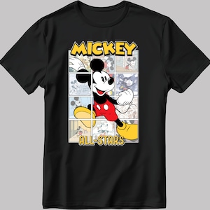 May include: Black t-shirt with a cartoon image of Mickey Mouse in a red and yellow outfit. The image is surrounded by smaller images of Mickey Mouse in different poses. The text "MICKEY ALL-STARS" is printed below the image.