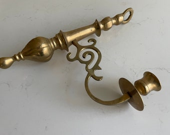 Brass candle wall sconce