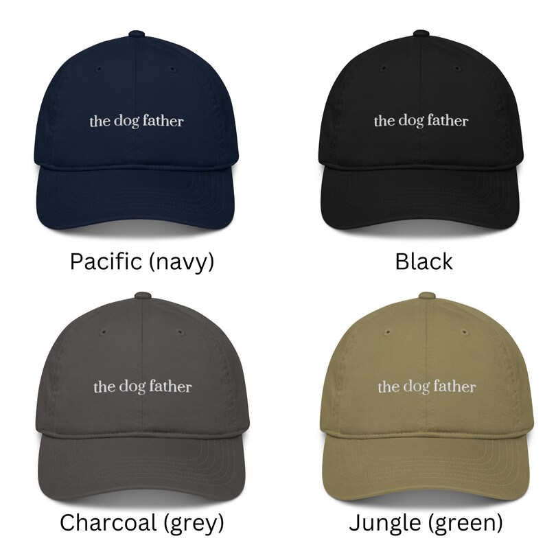 May include: Four baseball caps in navy, black, grey, and green. Each cap has the text "the dog father" embroidered on the front. The navy cap is labeled "Pacific", the black cap is labeled "Black", the grey cap is labeled "Charcoal", and the green cap is labeled "Jungle".