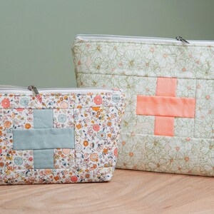 quilt block first aid fabric zipper pouch. Two sizes in a floral print