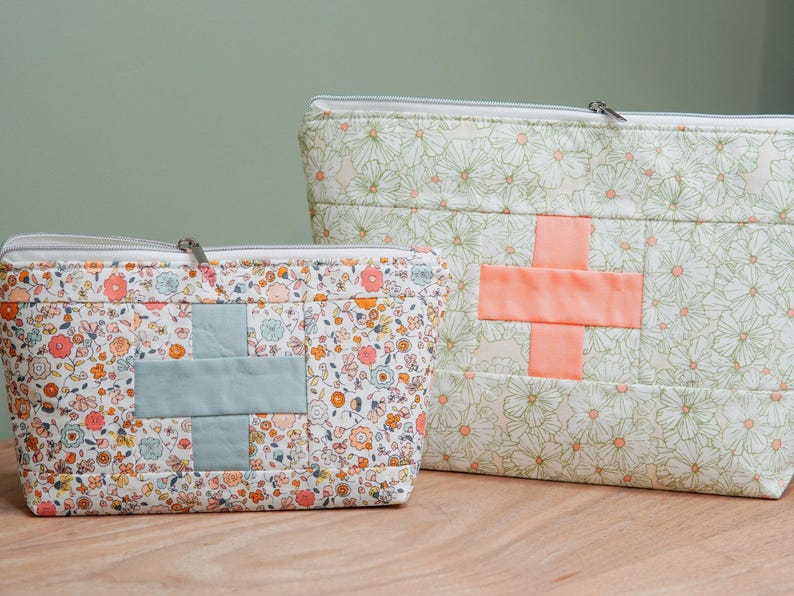 quilt block first aid fabric zipper pouch. Two sizes in a floral print