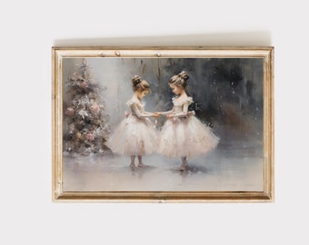 May include: A framed painting of two young girls in white tutus, standing in front of a decorated Christmas tree. The girls are holding hands and looking at each other. The painting is set against a gray background with a light dusting of snow.