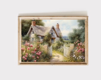 May include: A painting of a white cottage with a thatched roof, surrounded by a lush garden with pink flowers and a white picket fence. The cottage has a small porch with a door and windows. The garden is full of flowers and greenery. The painting is framed in a gold frame.