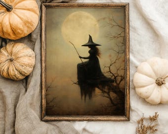 May include: A framed print featuring a witch silhouette perched on a tree branch against a full moon. The witch wears a pointed hat and flowing gown. The image has a vintage, spooky aesthetic, with pumpkins and fabric in the background.