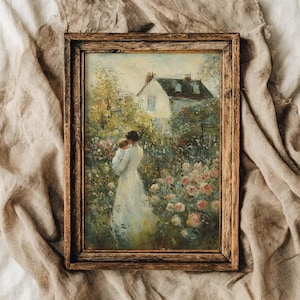 Peut inclure: Peinture vintage encadrée représentant une femme en robe blanche tenant un enfant dans un jardin. L'œuvre présente une maison en arrière-plan, entourée de verdure luxuriante et de roses roses. Le cadre est en bois foncé.