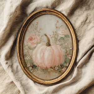 May include: Oval framed painting featuring a pink pumpkin and roses. The artwork has a vintage aesthetic with a gold-colored frame. The pumpkin is the focal point, surrounded by soft pink roses and delicate greenery.