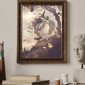 May include: A framed vintage illustration of a witch flying on a broomstick with a black cat and bats in the background. The witch is wearing a green dress and a pointed hat. The illustration is set against a dark, stormy sky.