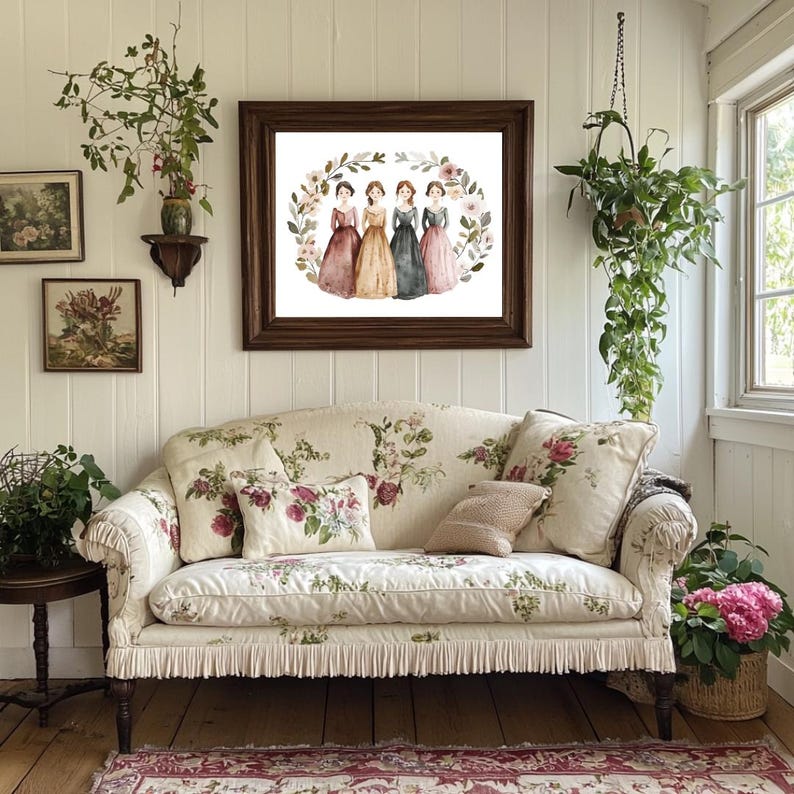May include: A framed watercolor print of four women in vintage dresses, surrounded by a floral wreath, hangs above a floral-patterned sofa with matching pillows. The room is decorated with hanging plants and small framed art.