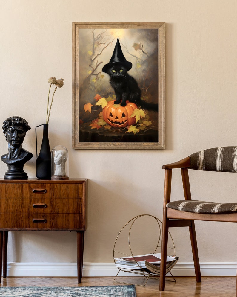 May include: A black cat wearing a witch's hat sits on top of a carved jack-o'-lantern pumpkin. The cat has green eyes and is surrounded by autumn leaves.