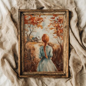 May include: Framed artwork featuring a woman with red hair in a blue dress, facing away from the viewer. The painting depicts a path leading to a house, surrounded by trees with orange and red leaves, in a rustic wooden frame.