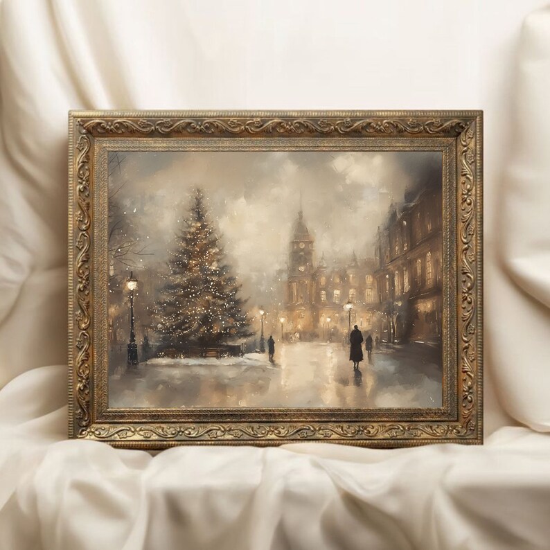 May include: A framed painting of a snowy city street scene with a lit Christmas tree in the foreground. The painting is in a gold frame with ornate details.