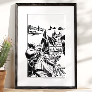May include: Black and white framed print of a robot battle scene. The artwork depicts two robots in combat, with one robot's hand extended. The background shows a cityscape and mountains. The text at the bottom reads "FIGHTING FANTASY ROBOT COMMANDO: FIGHTING THE ENEMY."