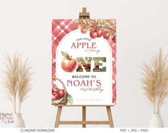 Op de afbeelding: Een welkomstbord voor een eerste verjaardag. Het bord heeft een rood-wit ruitpatroon, aquarelappels en de tekst "Our Little Apple is turning ONE". Het bevat een foto en de naam "Noah's" met de datum.