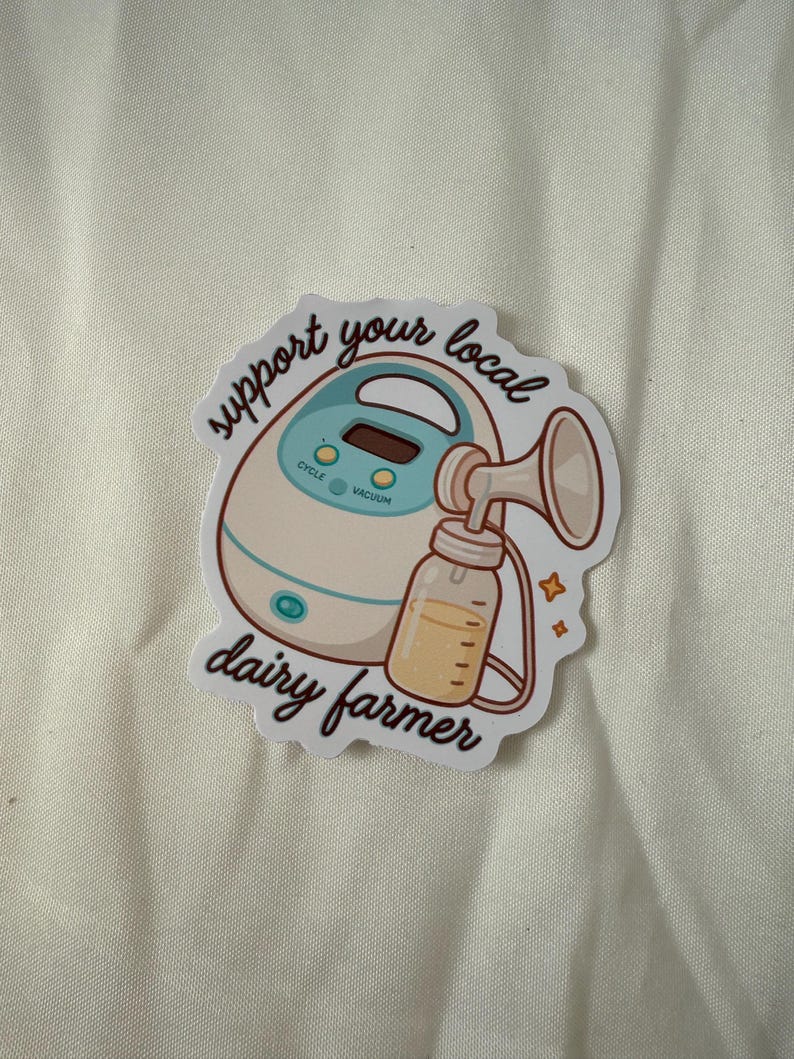 May include: A sticker showing a breast pump and a bottle of milk. The text on the sticker reads "support your local dairy farmer". The pump is white and teal, and the bottle is clear with yellow liquid.