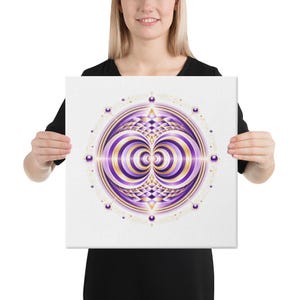 May include: A square canvas print featuring a symmetrical, circular mandala design in shades of purple, gold, and white. The artwork displays concentric rings, geometric patterns, and small purple spheres arranged in a circular border.