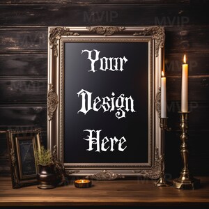 May include: A gold-toned ornate frame with a black chalkboard inside. The chalkboard has the text "Your Design Here" written in white. Two candlesticks with white candles are on either side of the frame. The candlesticks are gold-toned and have a decorative design.