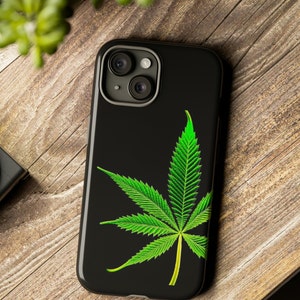 Marijuana Pot Leaf Phone Case with single large offset green pot leaf for iPhone 13 and 15