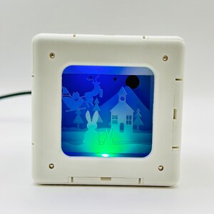 Luce tagliata sulla carta ioCube - Natale