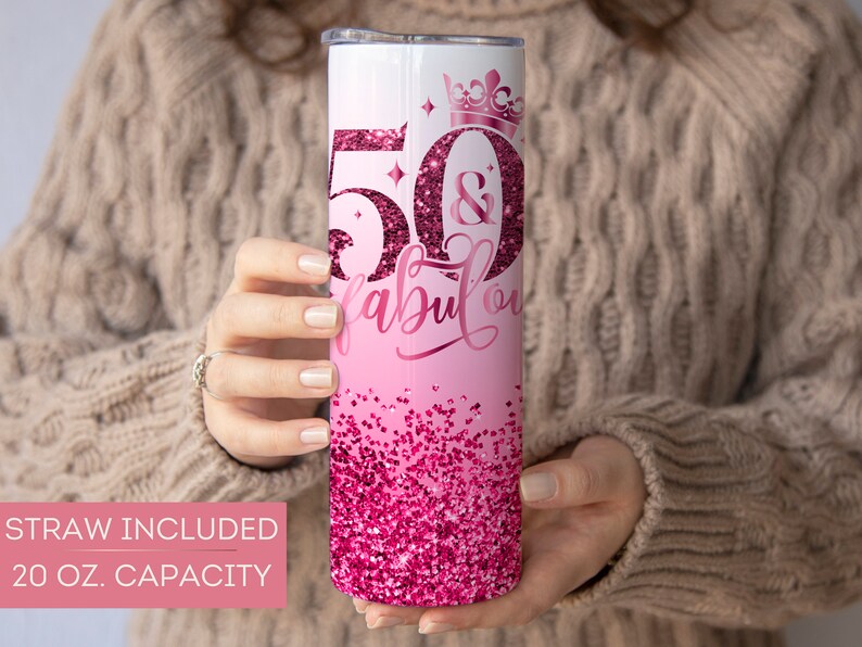 May include: Pink and white 20 ounce stainless steel tumbler with a glitter design and the text "50 & Fabulous" with a crown above the 50. Straw included.