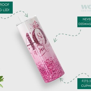 May include: Pink and white stainless steel tumbler with a glitter finish and the text "40 & fabulous" in pink. The tumbler has a clear sliding lid and a crown design on the top.