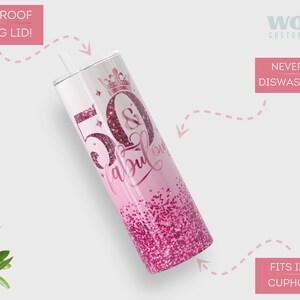 May include: Pink and white stainless steel tumbler with a glitter finish and the text "50 & fabulous" in a pink script font. The tumbler has a clear lid with a straw hole and a crown on top. The tumbler is leak-proof and dishwasher safe.