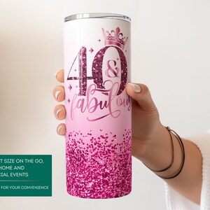 May include: Pink and white stainless steel tumbler with a glitter design and the text "40 & fabulous" with a crown above the 40.