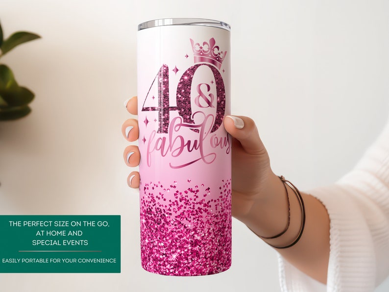 May include: Pink and white stainless steel tumbler with a glitter design and the text "40 & fabulous" with a crown above the 40.
