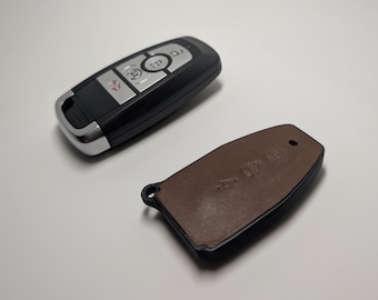 Ford slim custom key fob minimalistic design with debossed leather faceplate