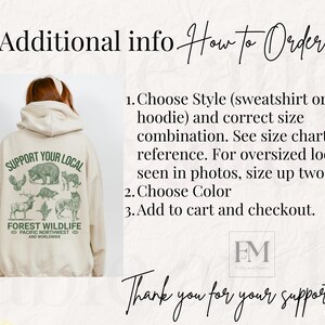 Puede incluir: Una sudadera beige con un estampado gr&aacute;fico verde que dice "Support Your Local Forest Wildlife" con im&aacute;genes de animales. El texto tambi&eacute;n dice "Pacific Northwest and Worldwide".