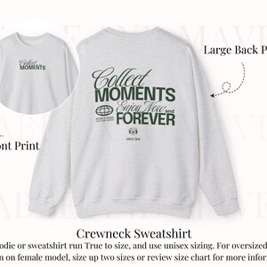 May include: Gray crewneck sweatshirt with a large back print that reads "Collect Moments Enjoy Now and Forever" and a smaller front print that reads "Collect Moments".