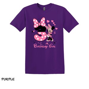 May include: Purple t-shirt with a pink Minnie Mouse graphic and the number 3. The text "Birthday Girl" is printed below the graphic.