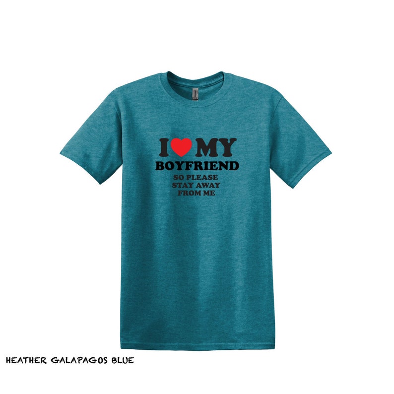 May include: A teal blue t-shirt with the text "I love my boyfriend so please stay away from me" and a red heart.