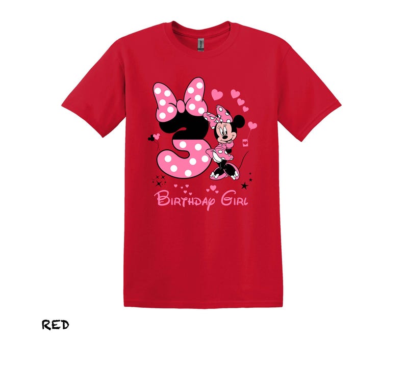 May include: Red t-shirt with a pink Minnie Mouse graphic and the number 3. The text "Birthday Girl" is printed below the graphic.
