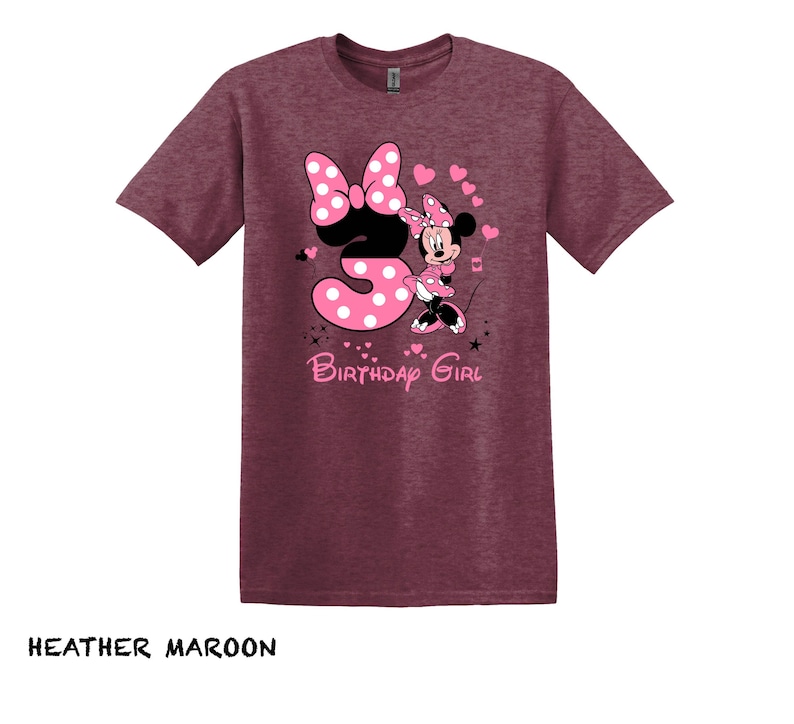 May include: Heather maroon t-shirt with a pink and white graphic of Minnie Mouse holding a number 3 and the text "Birthday Girl".