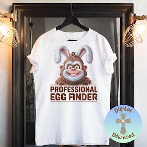 May include: A set of three ceramic mugs with a speckled, cream-colored glaze. Each mug features a different hand-painted design: a blue and green leaf, a yellow flower, and a red berry. The mugs have a simple, modern design.